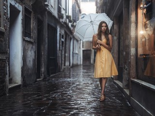 Quebra-cabeça «Girl under an umbrella»