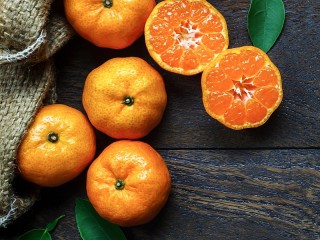 Jigsaw Puzzle «Tangerines on the boards»