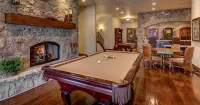 Puzzle Billiard room with fireplace