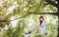 Rompecabezas The girl on the swing