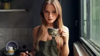 Puzzle girl with a cup