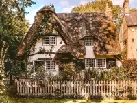 Jigsaw Puzzle House with thatched roof