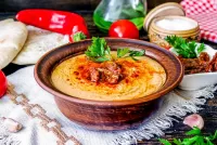 Jigsaw Puzzle Hummus with sun-dried tomatoes