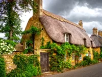 Quebra-cabeça Thatched cottage