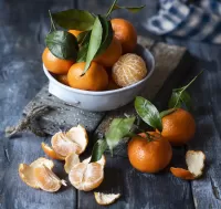 Puzzle Tangerines in a bowl