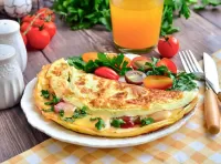 Puzzle Omelet and tomatoes