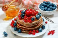 Jigsaw Puzzle With berries and honey