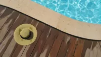 Jigsaw Puzzle Hat by the pool