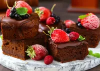 Bulmaca Chocolate muffin with berries