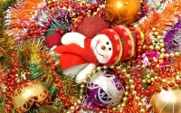 Puzzle Snowman among tinsel
