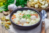 Puzzle Soup with meatballs