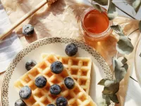 Puzzle waffles with blueberries
