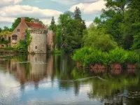 Puzzle Castle at the pond